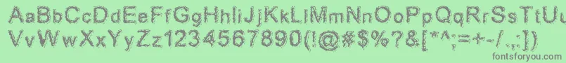 Aciddreamer Font – Gray Fonts on Green Background