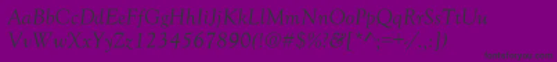 GoudyOldStyleNormalItalic-fontti – mustat fontit violetilla taustalla