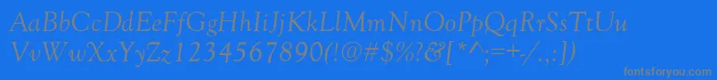 GoudyOldStyleNormalItalic-fontti – harmaat kirjasimet sinisellä taustalla