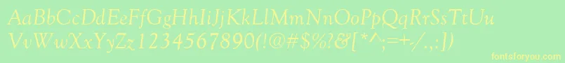 GoudyOldStyleNormalItalic-fontti – keltaiset fontit vihreällä taustalla