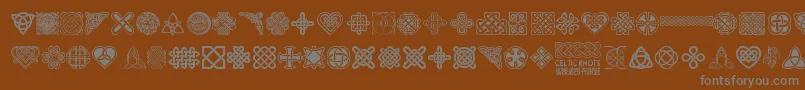 フォントCelticKnots – 茶色の背景に灰色の文字