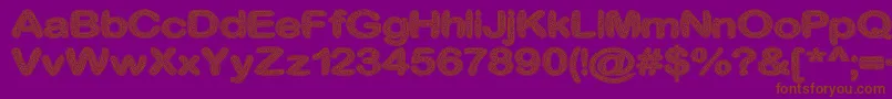 CrinkleCutGlass-Schriftart – Braune Schriften auf violettem Hintergrund