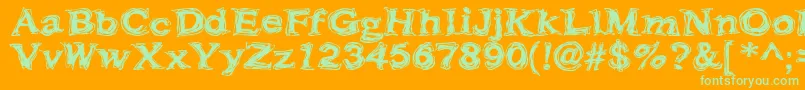 Czcionka Frazzle – zielone czcionki na pomarańczowym tle