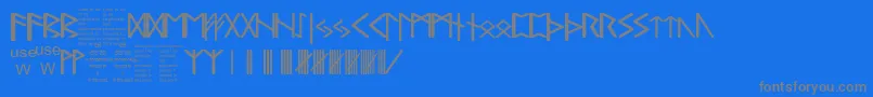 PaulsRealCelticRuneFont-Schriftart – Graue Schriften auf blauem Hintergrund