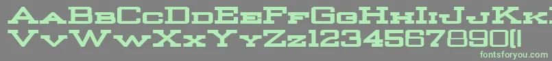 フォントStrongmanBold – 灰色の背景に緑のフォント