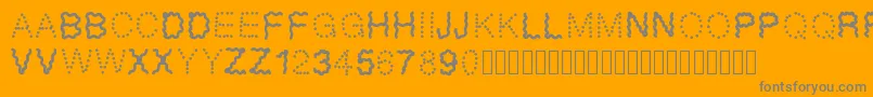 Funny-Schriftart – Graue Schriften auf orangefarbenem Hintergrund