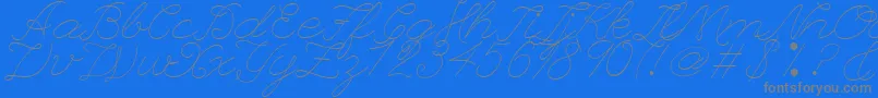 フォントLeagueScriptThinLeagueScript – 青い背景に灰色の文字
