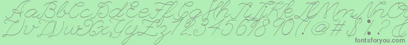 フォントLeagueScriptThinLeagueScript – 緑の背景に灰色の文字