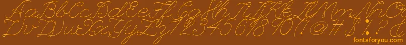 フォントLeagueScriptThinLeagueScript – オレンジ色の文字が茶色の背景にあります。