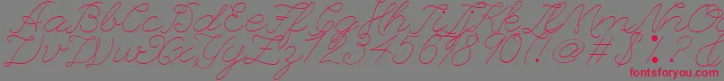 フォントLeagueScriptThinLeagueScript – 赤い文字の灰色の背景