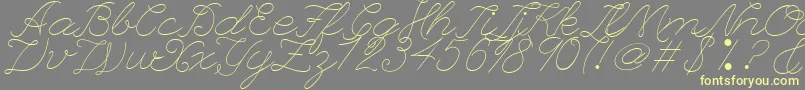 フォントLeagueScriptThinLeagueScript – 黄色のフォント、灰色の背景