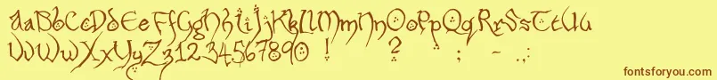 フォントHobbitonHandscrawlRegular – 茶色の文字が黄色の背景にあります。