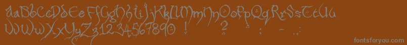 フォントHobbitonHandscrawlRegular – 茶色の背景に灰色の文字