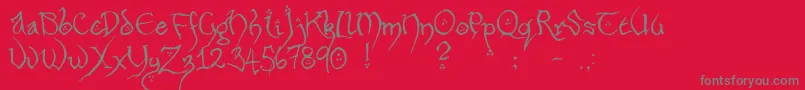 HobbitonHandscrawlRegular-Schriftart – Graue Schriften auf rotem Hintergrund