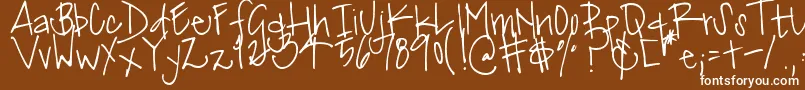 DjbMissJinkieVanPelt-fontti – valkoiset fontit ruskealla taustalla