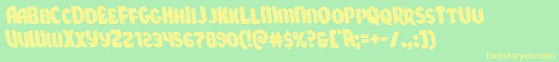 Xmasxpressleft Font – Yellow Fonts on Green Background