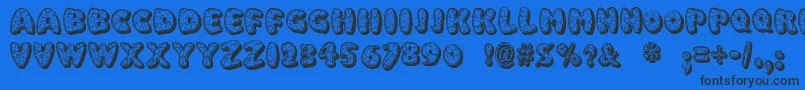 EggshellMosaic Font – Black Fonts on Blue Background