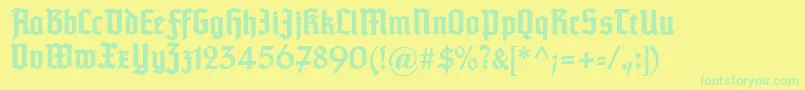フォントTypographertexturunz1Bold – 黄色い背景に緑の文字