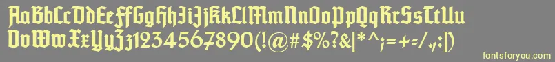 Typographertexturunz1Bold Font – Yellow Fonts on Gray Background