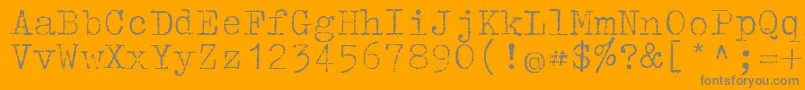 Tippa-Schriftart – Graue Schriften auf orangefarbenem Hintergrund