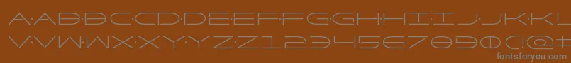 Factorcond-fontti – harmaat kirjasimet ruskealla taustalla