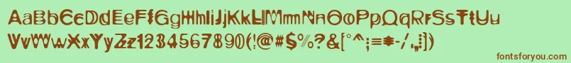 Ritualone Font – Brown Fonts on Green Background