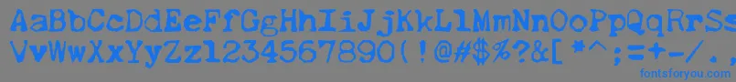 フォントThud – 灰色の背景に青い文字