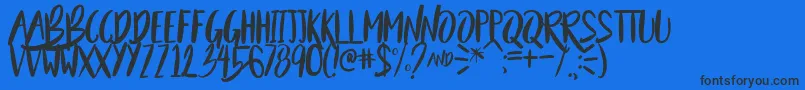 BeautyAndTheBeastSample Font – Black Fonts on Blue Background