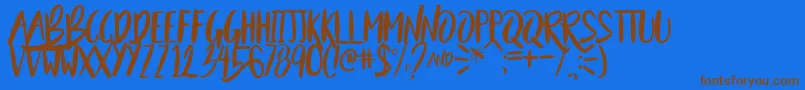 BeautyAndTheBeastSample Font – Brown Fonts on Blue Background