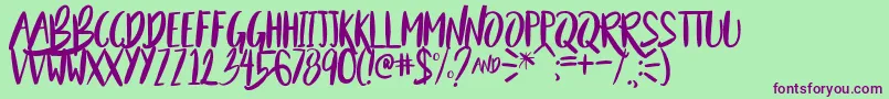BeautyAndTheBeastSample Font – Purple Fonts on Green Background