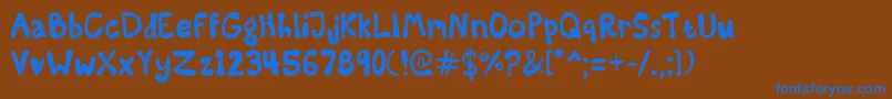 SomeKindaMadness Font – Blue Fonts on Brown Background