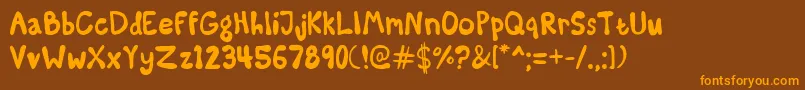 フォントSomeKindaMadness – オレンジ色の文字が茶色の背景にあります。