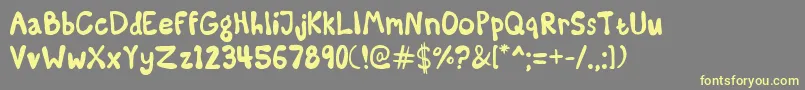 SomeKindaMadness Font – Yellow Fonts on Gray Background