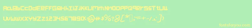 フォントKascrackfont – 黄色の文字が緑の背景にあります