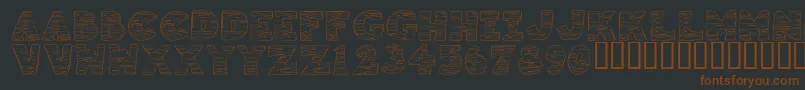 Шрифт KrTigrrr – коричневые шрифты на чёрном фоне