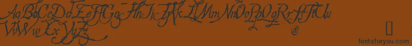 Hespd-Schriftart – Schwarze Schriften auf braunem Hintergrund