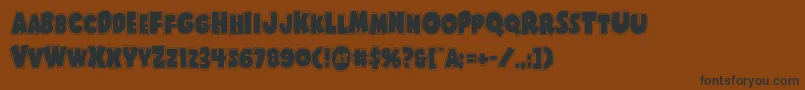 Shablagooacad-Schriftart – Schwarze Schriften auf braunem Hintergrund