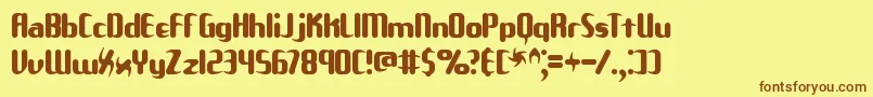 フォントUnxgala – 茶色の文字が黄色の背景にあります。