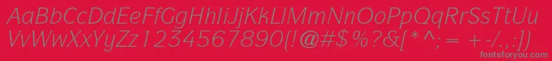 Czcionka ItcsymbolstdBookitalic – szare czcionki na czerwonym tle