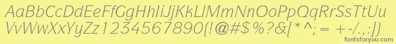 ItcsymbolstdBookitalic-Schriftart – Graue Schriften auf gelbem Hintergrund
