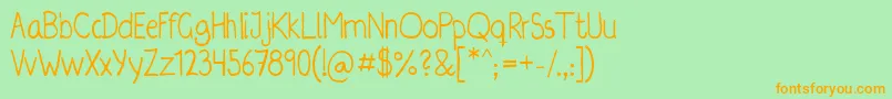 Irregularis Font – Orange Fonts on Green Background