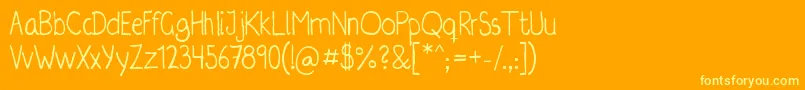 Irregularis Font – Yellow Fonts on Orange Background