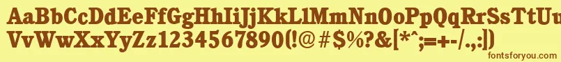 フォントCalgaryserialXboldRegular – 茶色の文字が黄色の背景にあります。