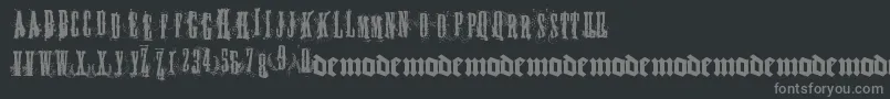 フォントFucky – 黒い背景に灰色の文字