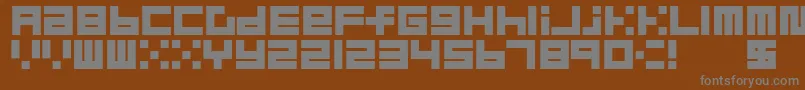 フォントBlockMerged – 茶色の背景に灰色の文字