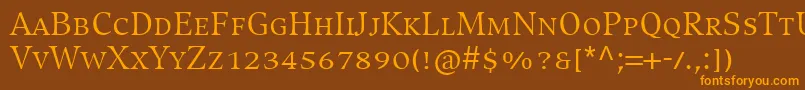 Czcionka CompatilExquisitLtComRegularSmallCaps – pomarańczowe czcionki na brązowym tle