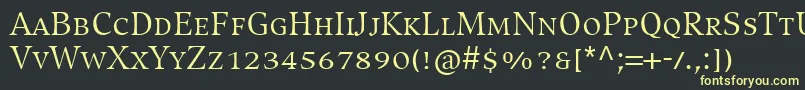 フォントCompatilExquisitLtComRegularSmallCaps – 黒い背景に黄色の文字