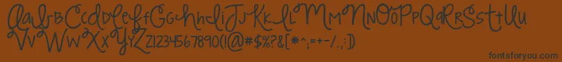 Kgstrawberrylimeade Font – Black Fonts on Brown Background
