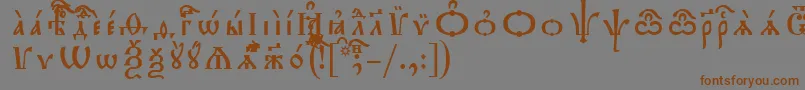 フォントTriodionIeucsSpacedout – 茶色の文字が灰色の背景にあります。