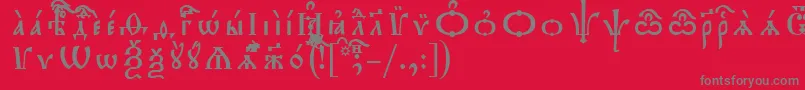 フォントTriodionIeucsSpacedout – 赤い背景に灰色の文字